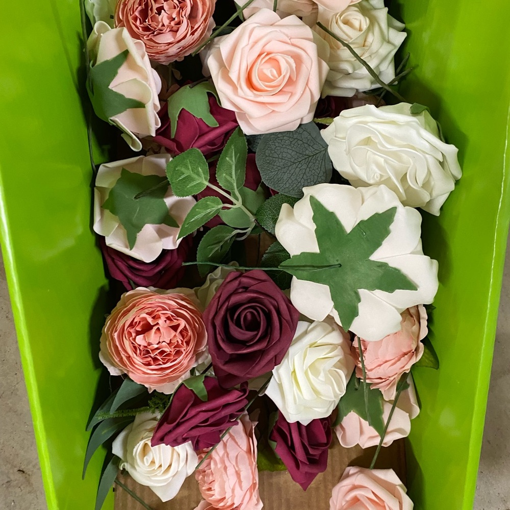 Artificial flowers wedding decor roughly 40 short stems used on name settings